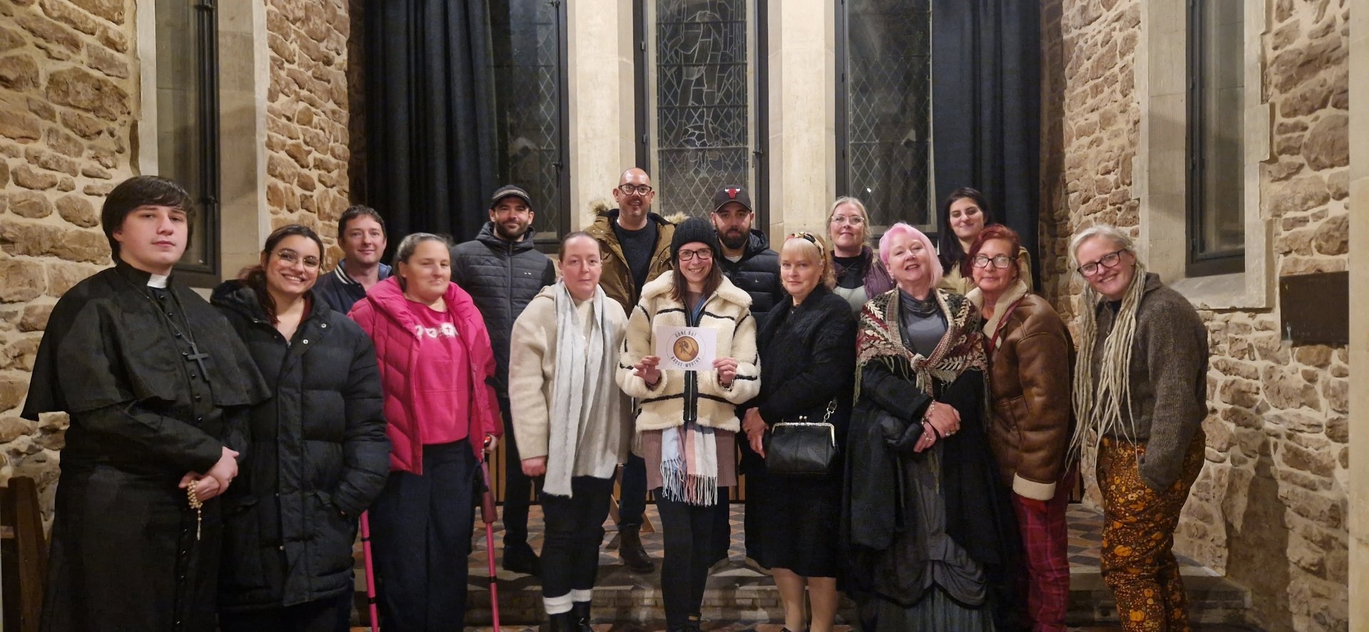 Tour group, candlelit chapel